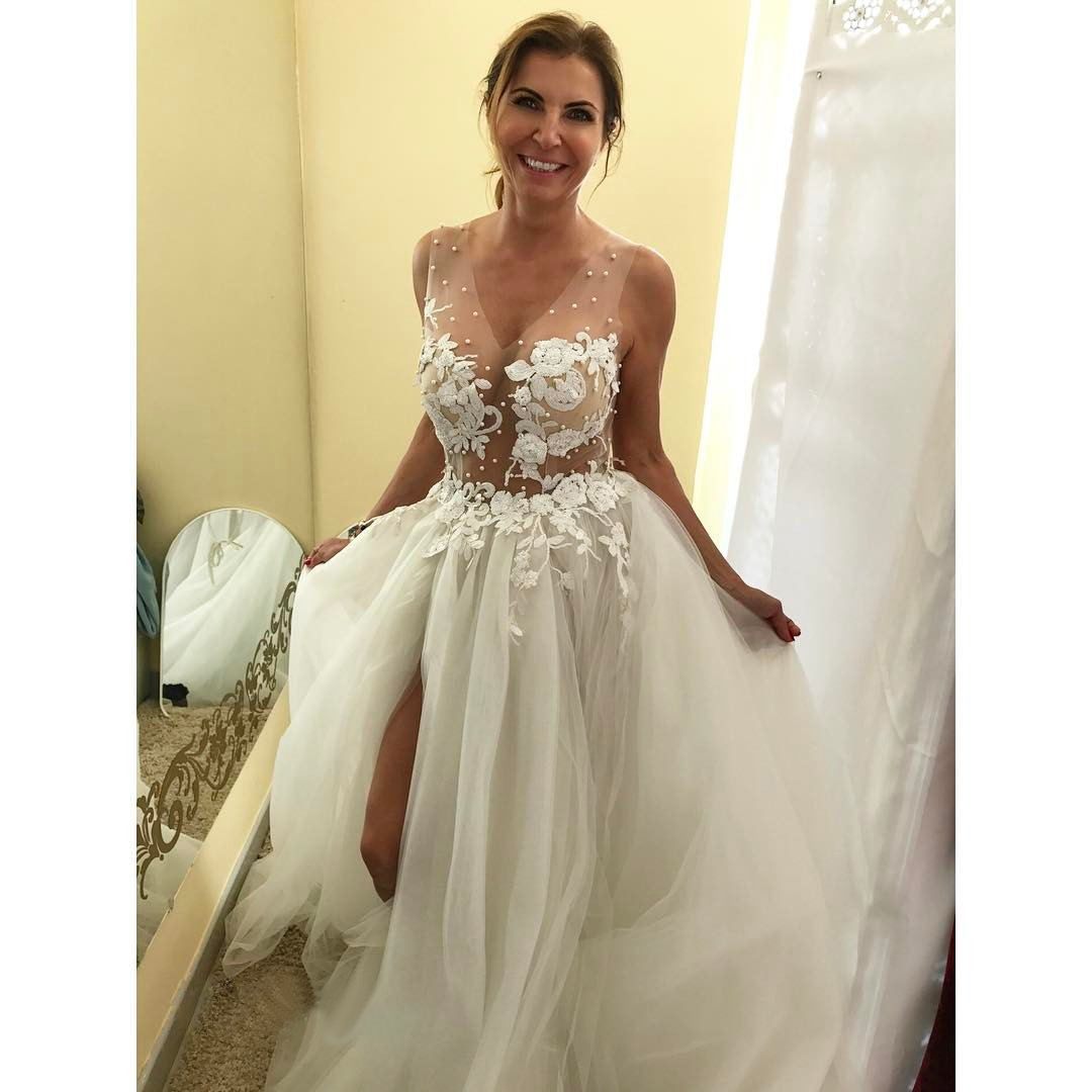 Sexy Sheer Corset Puffy Beach Wedding Dress With Slit And Long Train